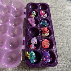 Hatchimals CollEGGtibles 9 Pack + Purple Egg Carton Glitter Figures: Pink Fox