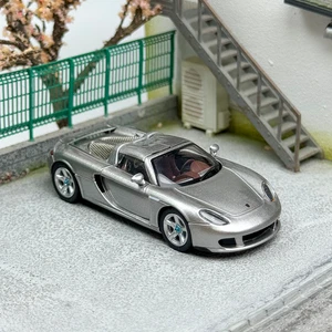 Coche modelo diecast Porsche Carrera GT Roadster plateado detallado 1:64 - Imagen 1 de 14