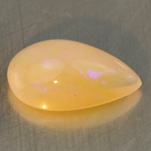 Video_2.66cts_Etiopía_Ópalo Natural_Transparente_Huevo de Jalea y Flash Púrpura_GM817 - Imagen 1 de 2