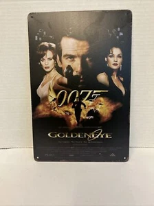 Póster metálico de la película Goldeneye 007 Pierce Brosnan impresionante signo de James Bond cueva - Imagen 1 de 2