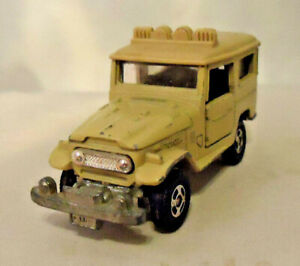 VINTAGE TOMICA 1/60 TOYOTA LAND CRUISER DIE CAST VEHICLE WITH OPENING DOORS
