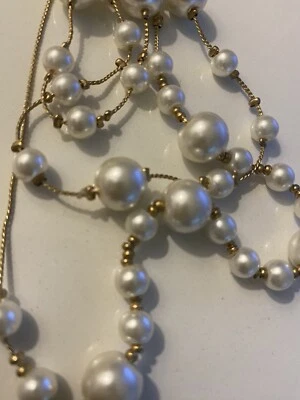 This is A Multi-Strand Pearl Necklce It Features Several Strands Of Pearls Faux - Image 1 of 4