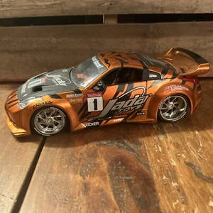 JADA IMPORT RACER NISSAN Z COBRE/NARANJA 1:18 - Imagen 1 de 16