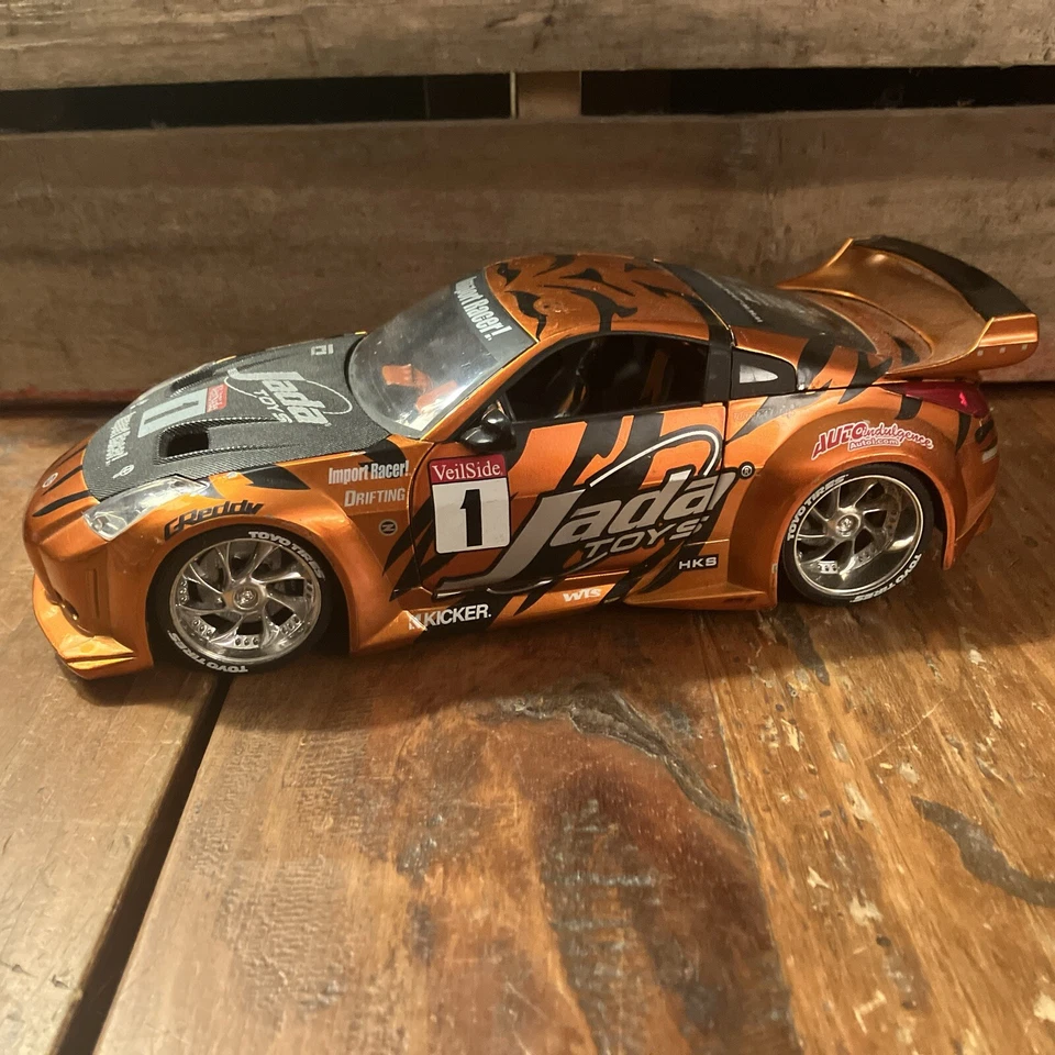 JADA IMPORT RACER NISSAN Z COPPER/ORANGE 1:18  - Image 1 of 4