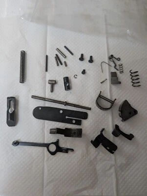 Lote de piezas de reparación High Standard 106 107 Supermatic martillos seguridad muelle lateral Foto 1 de 4
