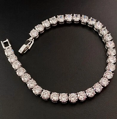 Brazalete de tenis redondo de diamantes simulados de 5 mm enchapado en oro blanco de 18 k de más de 7,5" Foto 1 de 4