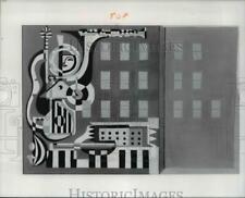 1977 Press Photo Musical instrument motif created by John Puskas for Norton Bldg