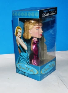 Funko Wacky Wobbler Grace Kelly (vestido rosa) metálico 2010 CHASE - Imagen 1 de 5