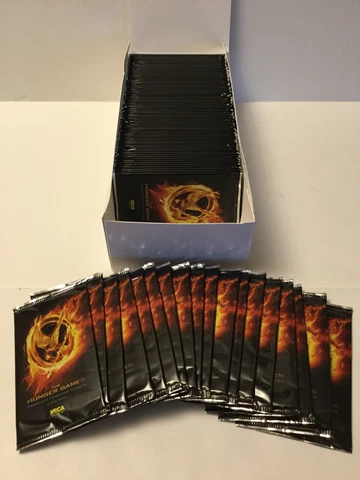 HUNGER GAMES TRADING CARDS LOT OF 100 PACKS FROM SEALED CASE = 4 BOXES + Cover