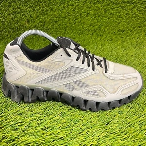 Zapatillas deportivas Reebok ZigTech Sonic para niños talla 6,5Y blancas negras - Imagen 1 de 11