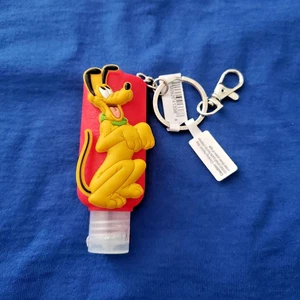Disney Parks Pluto Hand Sanitizer Bottle Key Chain Collectible 1 Fl Oz NWT - Picture 1 of 2