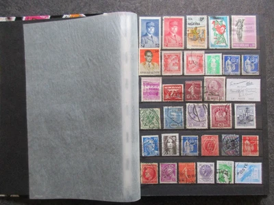 Vrac de timbres en classeur tous pays oblitéré ou neuf tous états à trier MX175 - Photo 1/4