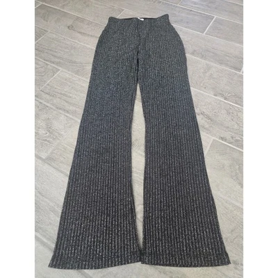 Pantalones acampanados UO Urban Outfitters negros plateados metálicos acanalados para mujer XS brillantes Foto 1 de 4