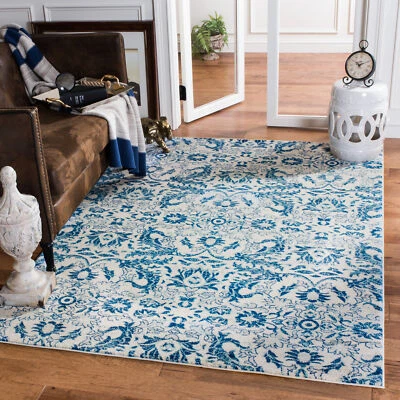 Alfombras de área Evoke Power con telar Safavieh marfil/azul - EVK238C Foto 1 de 2