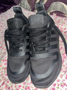 full black adidas trainers