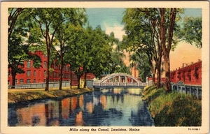 Lewiston ME-Maine, Mills Along The Reflective Canal, Bridge Vintage Postcard - Picture 1 of 2