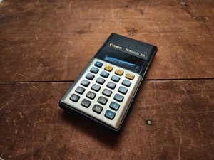 Calcolatrice vintage Canon Palmtronic 8M LED blu - Foto 1 di 18