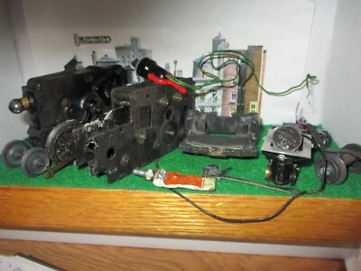 GOODY BAG of VINTAGE LIONEL O GAUGE PARTS-TRUCKS, MOTORS, WHEELS, LUBE & MORE! - Image 1 of 4