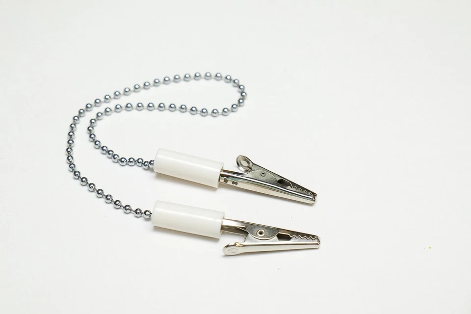 CLIP SOPORTE BABERO DENTAL CADENA BOLA FLEXIBLE - CODIFICADO POR COLORES BLANCO 001-1111 Foto 1 de 1