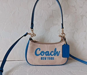 Neu mit Etikett Coach CY734 MINI Teri Umhängetasche charakteristisches Canvas mit Coach-Grafik MINI TERI - Bild 1 von 17