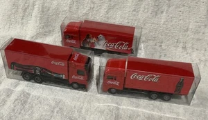 COCA COLA TRUCKS X 3 ~~New 1:64 Scale 2x Man & 1 Mercedes - Picture 1 of 3
