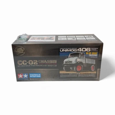 Kit de camión Tamiya Mercedes-Benz Unimog 406 1/10 4x4 CC-02 prepintado azul gris Foto 1 de 4