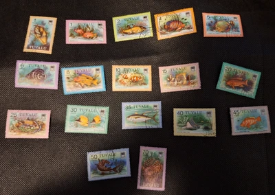 TUVALU 1980s set of 17 Stamps FISH unmounted stamped - Image 1 of 4