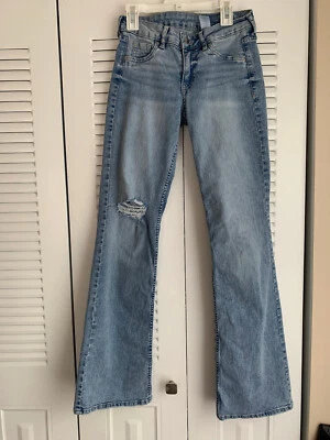 Pantalones de mezclilla acampanados rasgados cintura baja bootcut mezcla algodón azul para niñas talla 2 Foto 1 de 4