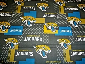 NFL Jacksonville Jaguars Cotton Fabric 9" x 56" (1/4 Yard ) - Picture 1 of 1