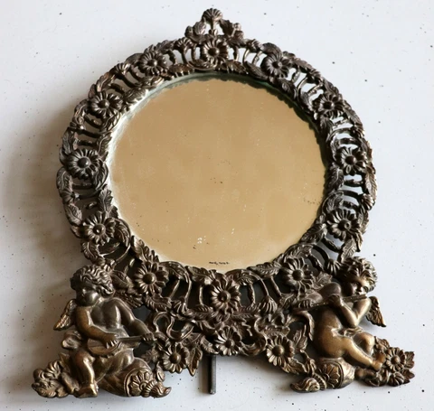 Antique Round Cast Iron Mirror Frame Easel Back with Winged Cupids Cover