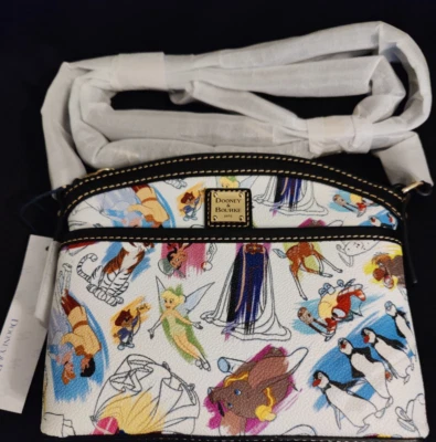 Bandolera Disney Dooney & Bourke tinta y pintura abovedada Tinker Bell Dumbo MWT 2020 Foto 1 de 4