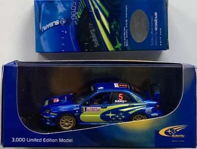 1/43 Prodrive (IXO) 05M43 Subaru Impreza WRC 2005 Monte Carlo #5 Solberg & Mills - Image 1 of 4