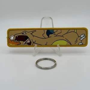 Charizard リザードン Jet Tag - Pokémon - Double-sided Embroidered Charm w/ Keyring - Picture 1 of 6
