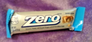 6 ZERO CANDY BARS CARAMEL PEANUT ALMOND NOUGAT W WHITE FUDGE EX. 2025 1.85 OZ - Picture 1 of 1