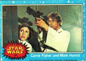 1977 Topps Star Wars Serie 1 Border Azul #65 Carrie Fisher y Mark Hamill - Imagen 1 de 2