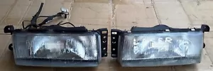 JDM Mazda Ford Laser BG-5PF stanley 1604 Plastic Headlights PAIR 1989 94 model - Picture 1 of 7