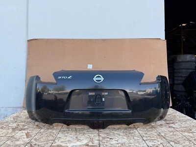 CONJUNTO CUBIERTA PARACHOQUES TRASERO NISSAN 370Z 2009-2021 OEM (NEGRO) Foto 1 de 4