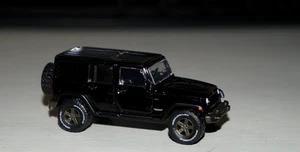 Greenlight 1/64 70th Anniversary 2016 Jeep Wrangler Unlimited Black 4 Door JK - Picture 1 of 3