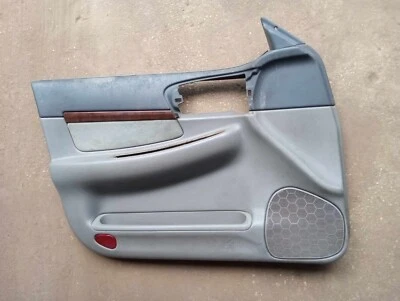 Panel de puerta delantera izquierda usado se adapta a: panel de moldura Chevrolet Impala 2000-2005 Foto 1 de 4