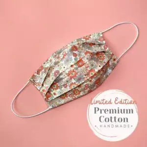 Premium Baumwoll Gesichtsmaske mit Filtertaschen waschbar Handarbeit - orange Blumen - Bild 1 von 9