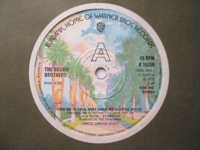 The Doobie Brothers "Take Me In Your Arms" Warner Bros UK 7" Single EX - Image 1 of 3