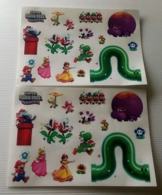 Super Mario Bros Wonder Aufkleber Nintendo X2 Stickerbögen Mario Peach Yoshi - Bild 1 von 2