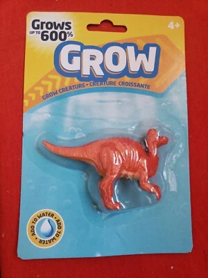 RELOJ JUGUETE DINOSAURIO CORYTHOSAURUS MAGIC GROW ¡CRECE HASTA 600% EN AGUA! NUEVO Foto 1 de 2