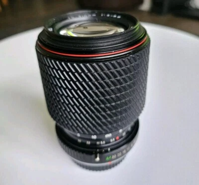 Tokina SD 70-210mm F/4-5.6 | OM Mount Vintage Manual Focus Camera Lens - Image 1 of 4