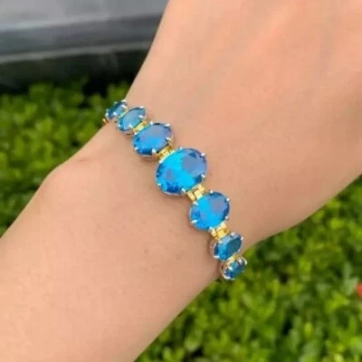 Brazalete de tenis de eslabones vintage enchapado en oro amarillo de 14 quilates con topacio azul creado en laboratorio de 16 quilates Foto 1 de 4