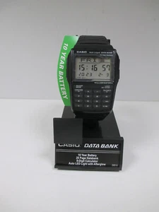 MONTRE CASIO DATA BANK Calculator illuminator DBC-32 N° 2888 Notice + Boite - Foto 1 di 9