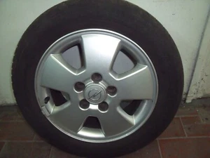 4 Opel Alufelgen 5 Loch mit Semperitreifen 195/60 R 15 V mit 5 bis 6mm Profiltie - Bild 1 von 6