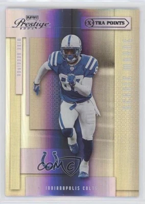 2004 Playoff Prestige Xtra Points Purple /75 Reggie Wayne #64 - Image 1 of 2