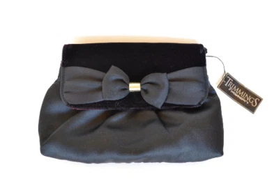 Bolso sin asas de terciopelo negro satinado con lazo adornos dorado lamé de la década de 1980 nuevo con etiqueta Foto 1 de 4