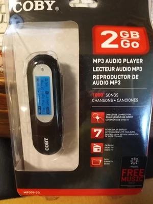 NEW SEALED Coby MP3052G 2GB USB-Stick MP3 Player LCD Screen w/ FM Radio  (65A) - Image 1 of 3